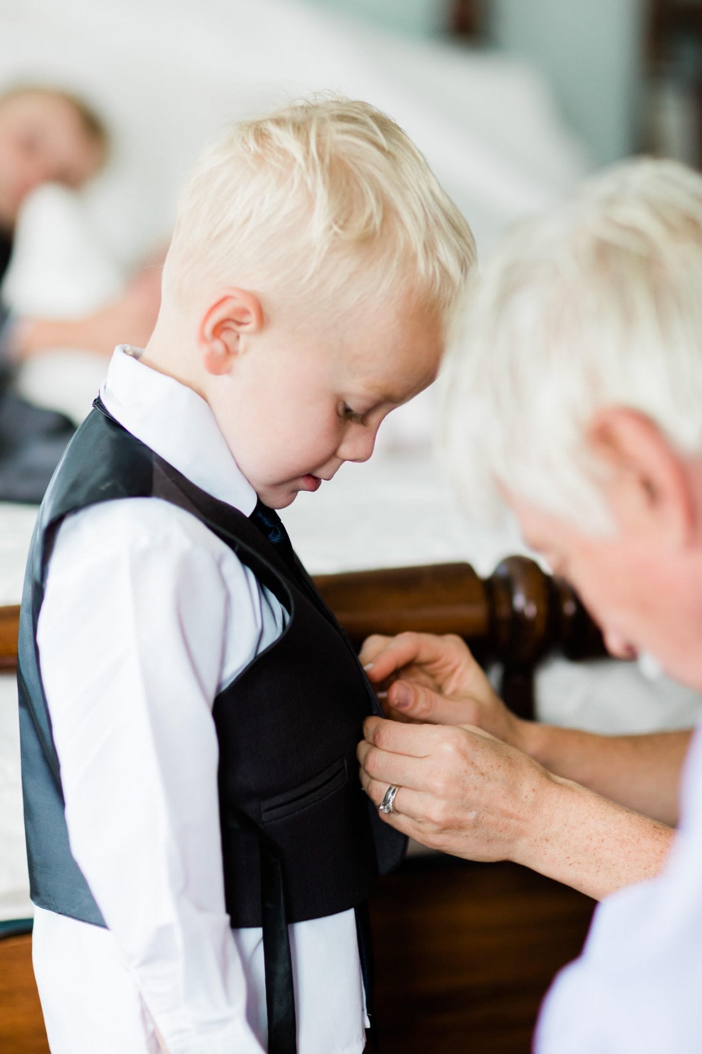 Little boy getting ready for a wedding | Vancouver wedding photographer