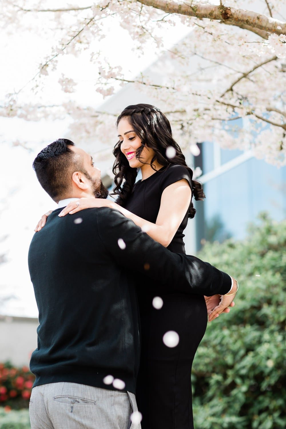 Engagement photo with cherry blossoms | Vancouver wedding photographer