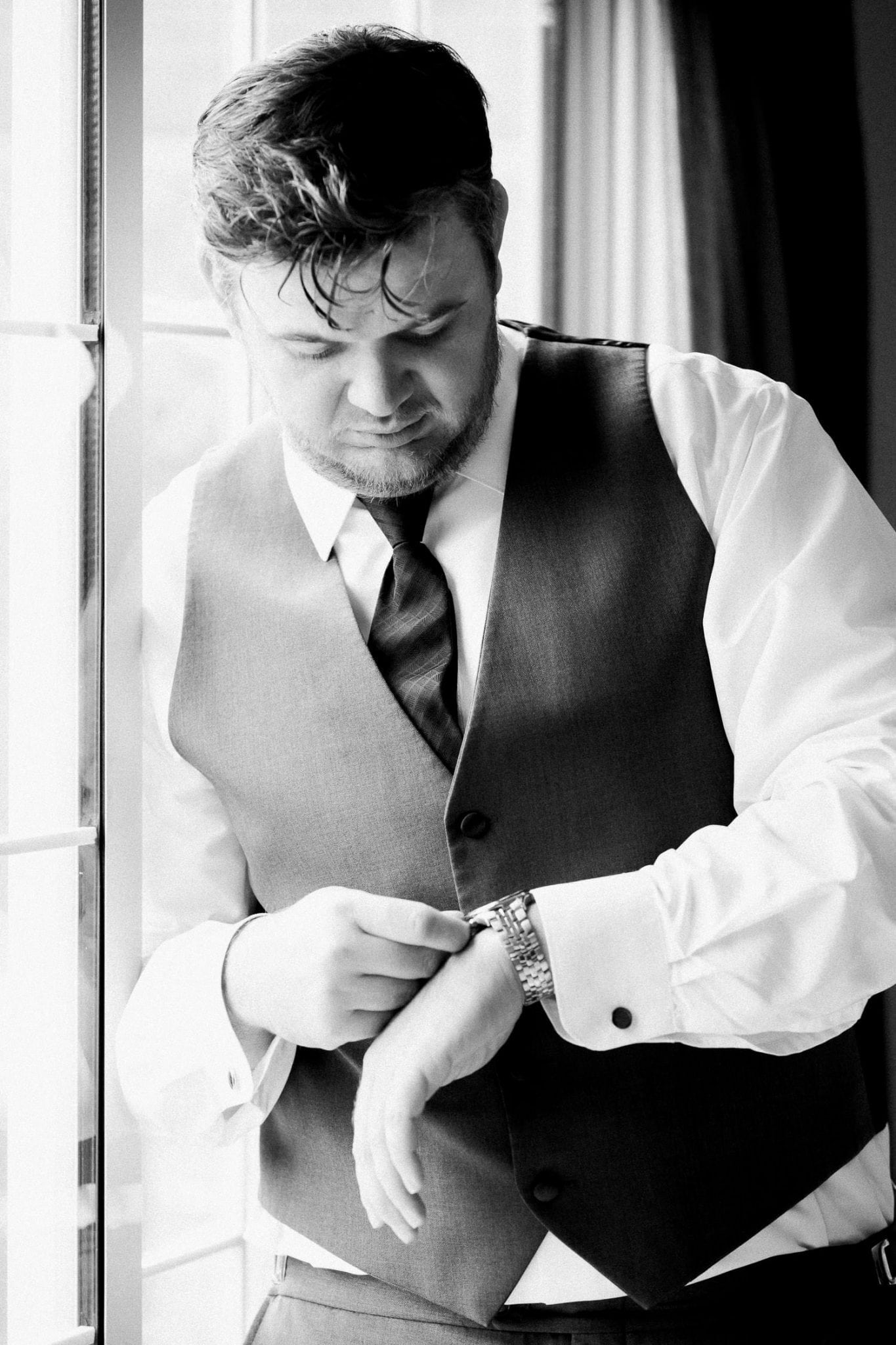Groom during morning prep in b/w | Vancouver wedding photographer