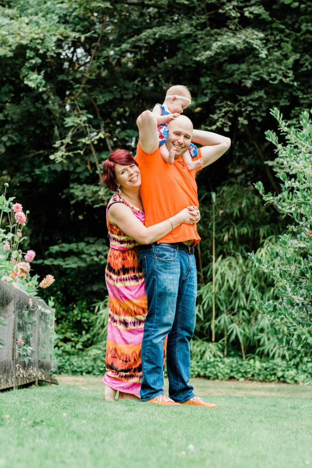 Couple with the baby hugging each other. Family Photo in Burnaby Village Museum